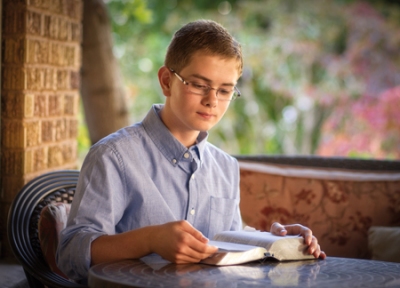 Young Young Man Reading the Scriptures